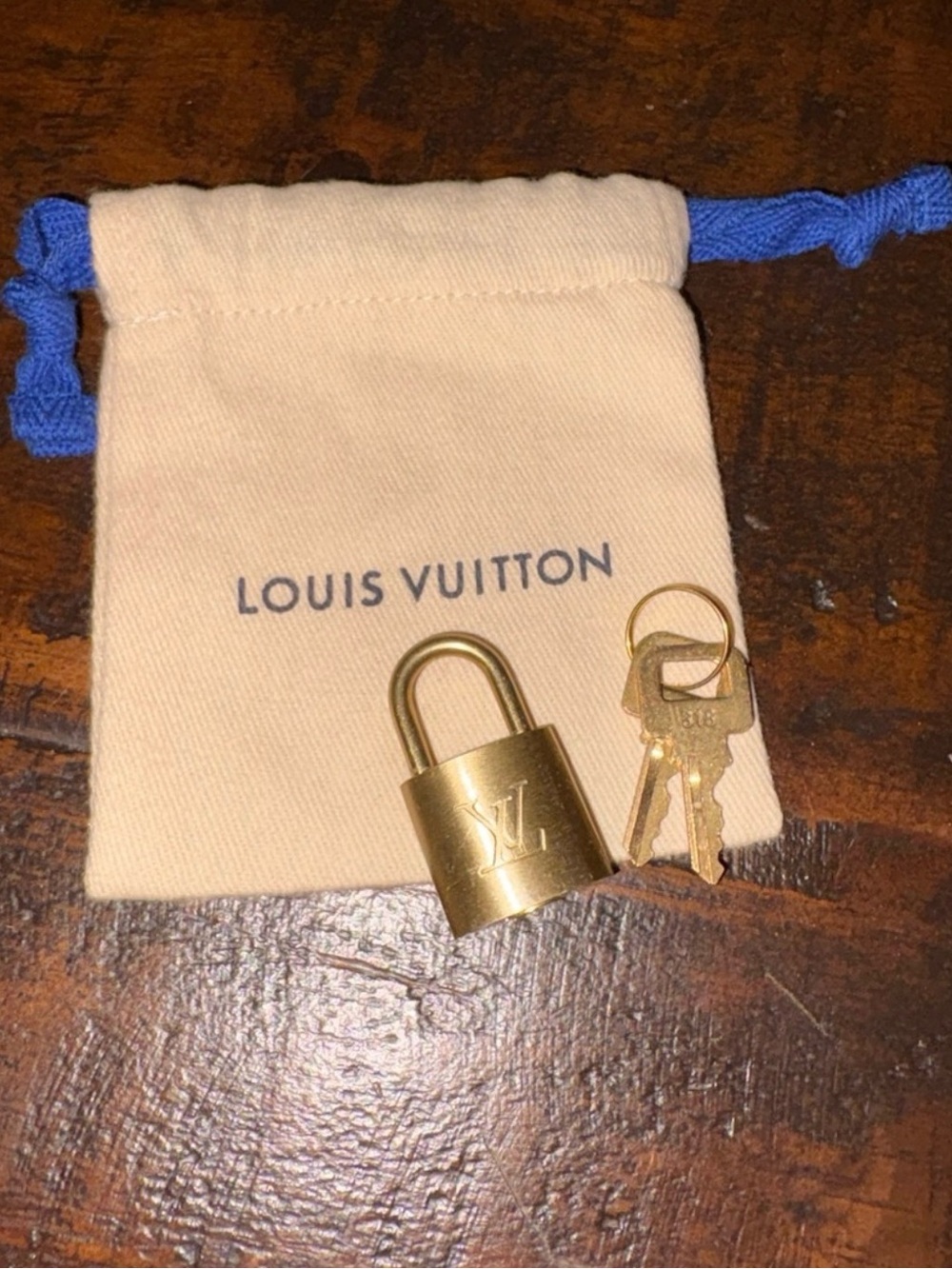 Louis Vuitton Gold-tone Padlock and Keys with Beige Drawstring Pouch